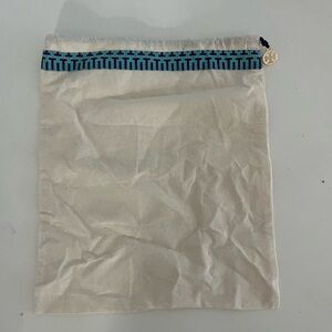 Cream Drawstring Bag with Blue Trim